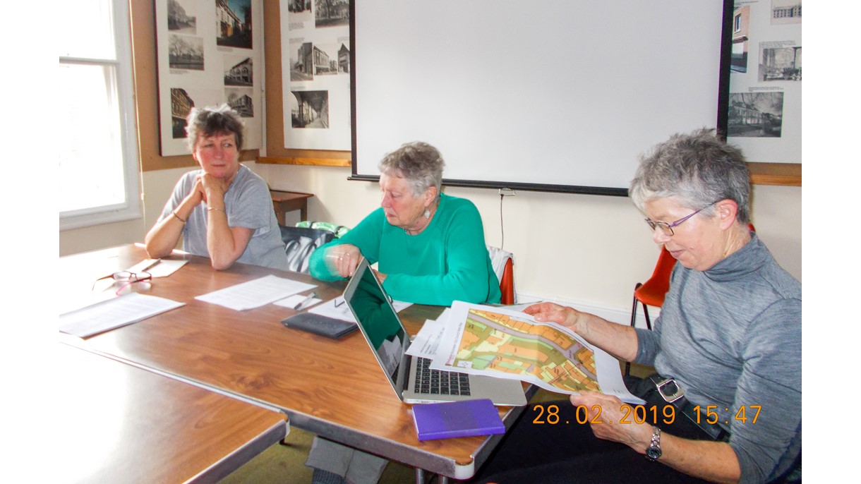 City of Winchester Trust Volunteers discussing Buildings of Faith Survey
