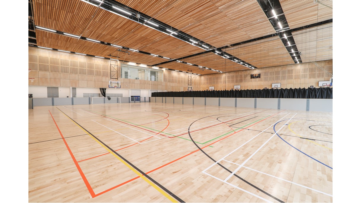 Beautiful wood finish in natural light sports hall