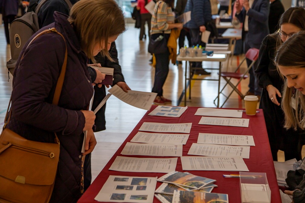 Jobs Fair Feb 2023 woman looking at leaflets