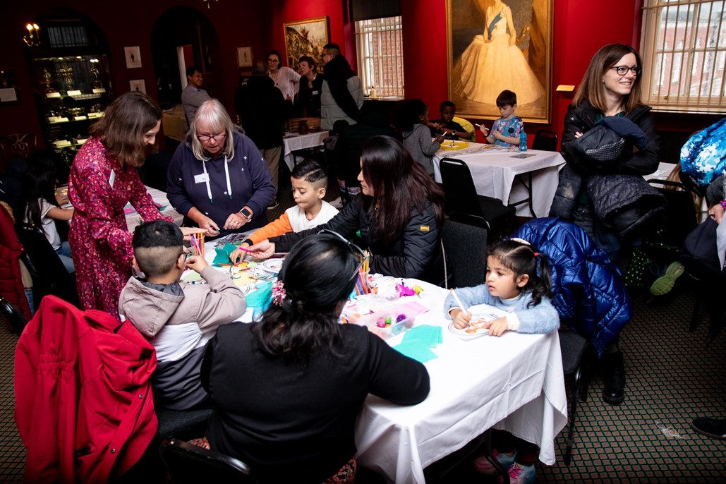 article thumb - Children and families taking part in craft activities.