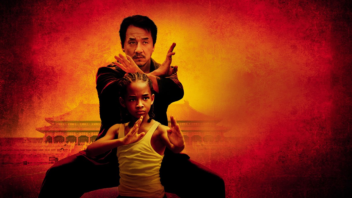 article thumb - Karate Kid movie poster. A boy and a man in a karate pose with an orange background.